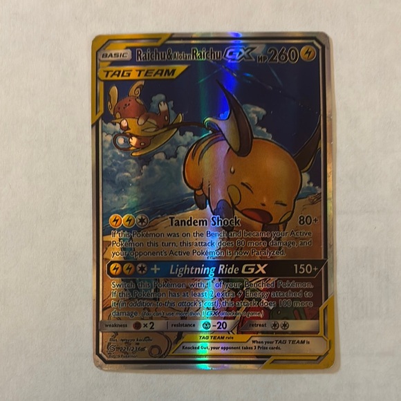 Pokemon Raichu&AlolanRaichuGX 221/236 Trading Card Large Crease Top Left Pokemon Raichu&AlolanRaichuGX 221/236 Trading Card Large Crease Top Left